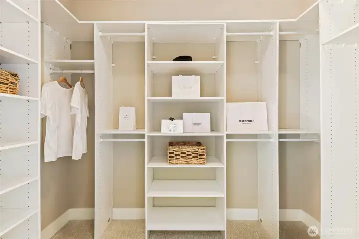 One of two primary walk-in closets.