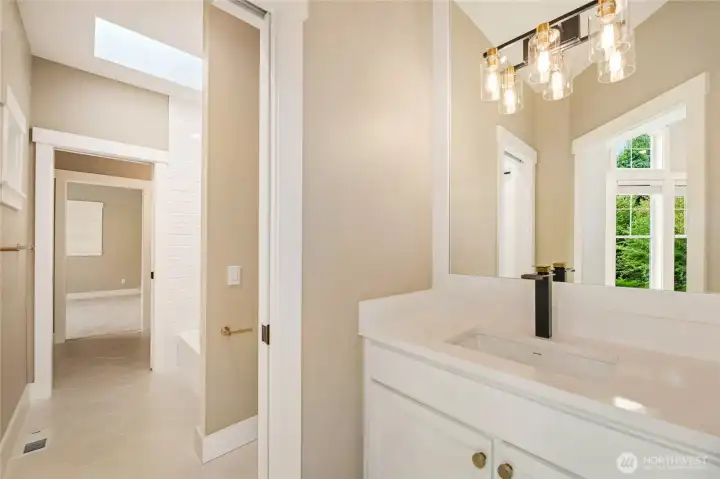 Jack & Jill Bathroom w/ two vanities.