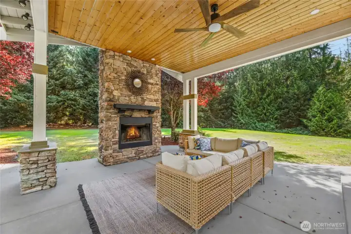 Relax & entertain year-round on inviting covered patio featuring cozy fireplace, private jacuzzi retreat, built-in grill.
