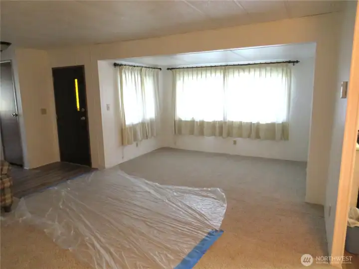 Living room with tip out see the new carpet