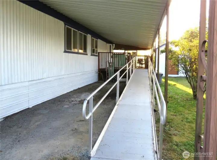 Newly installed ramp to back deck under carport