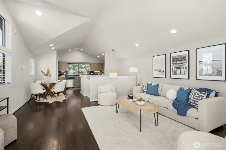 The light and bright top-floor living area provides a Sound view on one end and a treehouse view on the other!