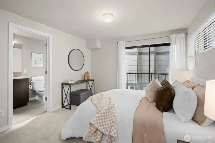 Primary Suite with its own Julliette balcony that is facing the Sound.