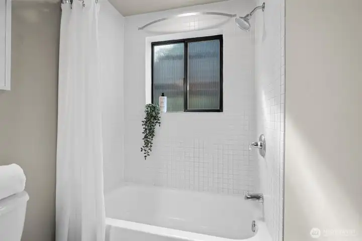 Primary bathroom shower/bath.