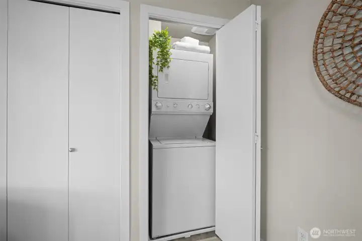 There is a convenient stacked laundry in the second bedroom.