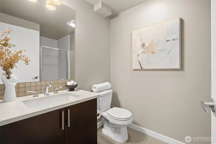 The first-floor bedroom is an ensuite with a 3/4 bath!