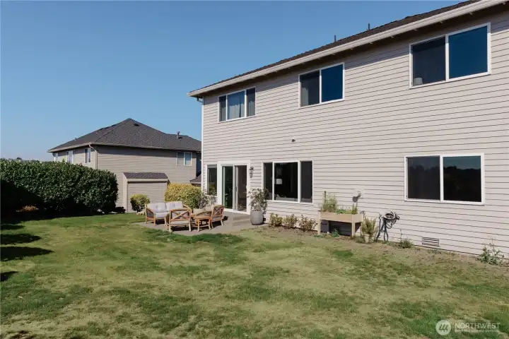 Well manicured flat backyard