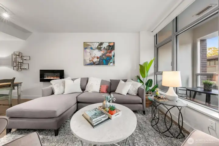 Living room with electric fireplace.