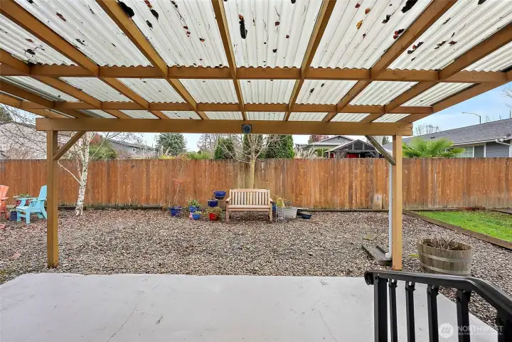 Covered patio looking outward. Stay dry during the wet and rainy PNW fall and winter seasons.