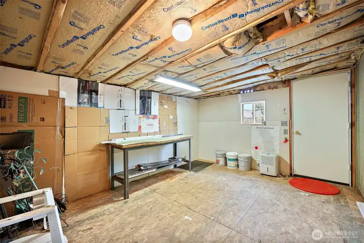 Attached shop/hobby space with separate entrance with power and heat.