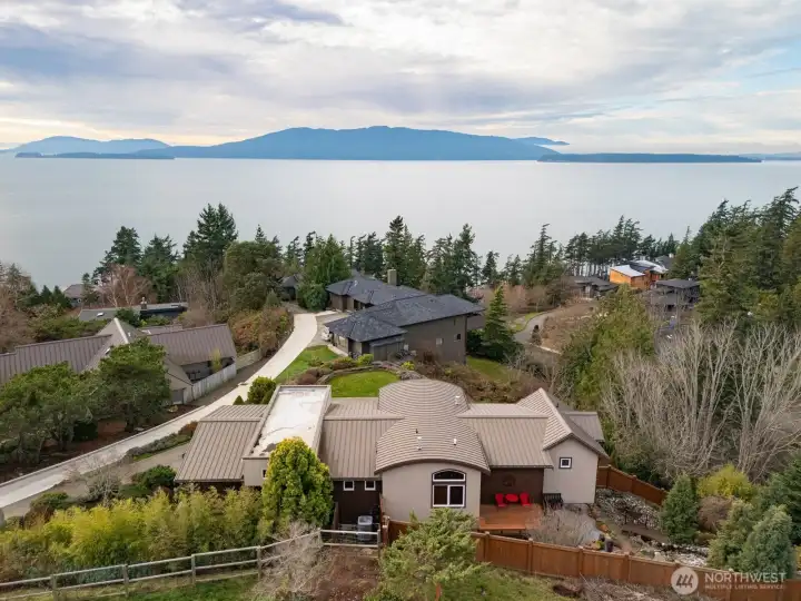 The architectural details and features of this home are incredible from the rear and the front elevations of this home and the views are even more fabulous!
