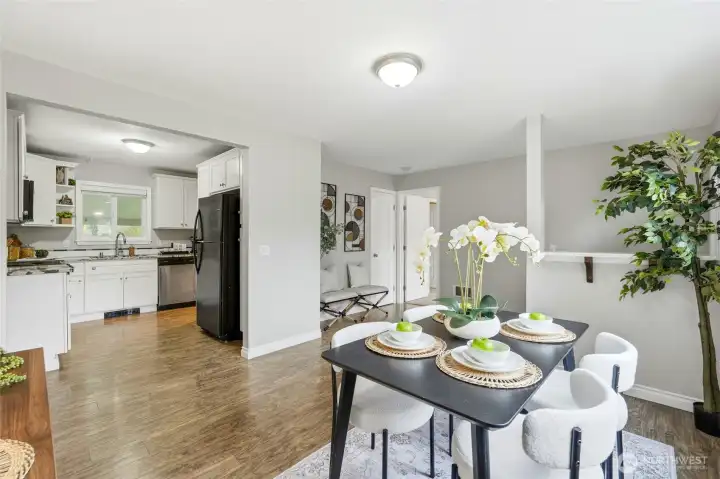 Light-filled dining space positioned perfectly between the kitchen and entry for easy everyday living.