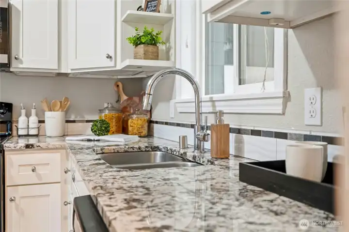 Whether preparing weeknight meals or hosting larger gatherings, the kitchen offers both convenience and visual appeal.