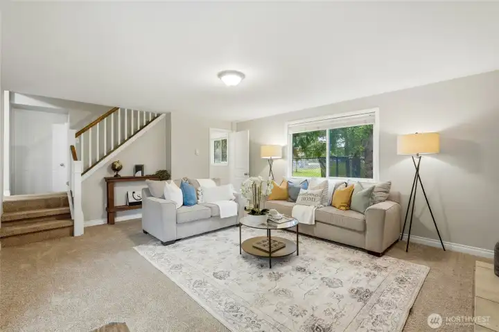 The family room offers a warm and inviting retreat designed for comfort and relaxation.