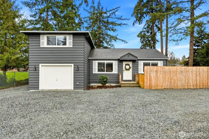 The property offers a peaceful setting while remaining conveniently connected to nearby amenities. Local schools, shopping, and everyday services are within easy reach.