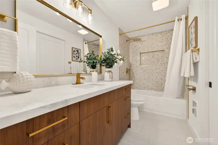 Main level bathroom with designer finishes.