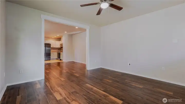 Living room, big window for natural light to carry through.