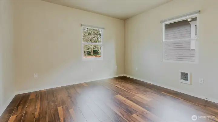 Bright 2nd bedroom that can easily adapt to your lifestyle needs.