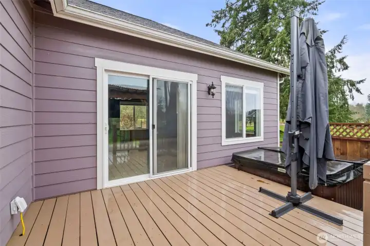 Second back deck from primary bedroom of main home with hot tub & second gazebo.