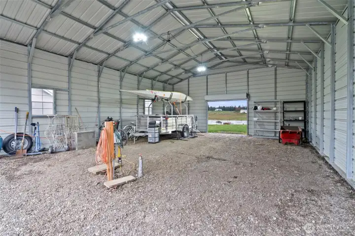 RV Parking with drive through garage door in rear.