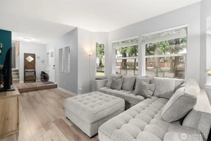 Enjoy your cozy living room while you take in the trees and nature outside!