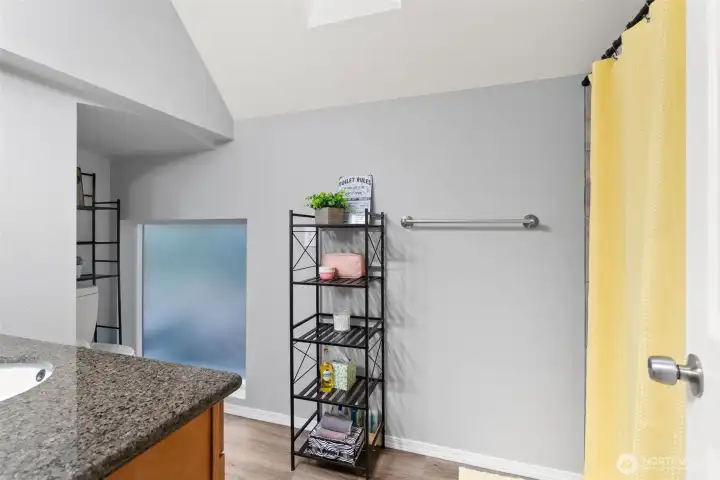 One of the full bathrooms also has vaulted ceilings and a skylight!