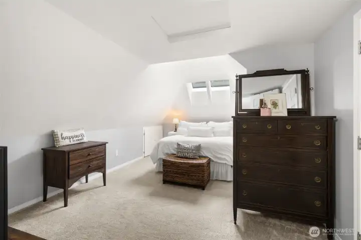 This beautiful and unique owners suite sits at the top of the stairs offering privacy and your own private oasis!