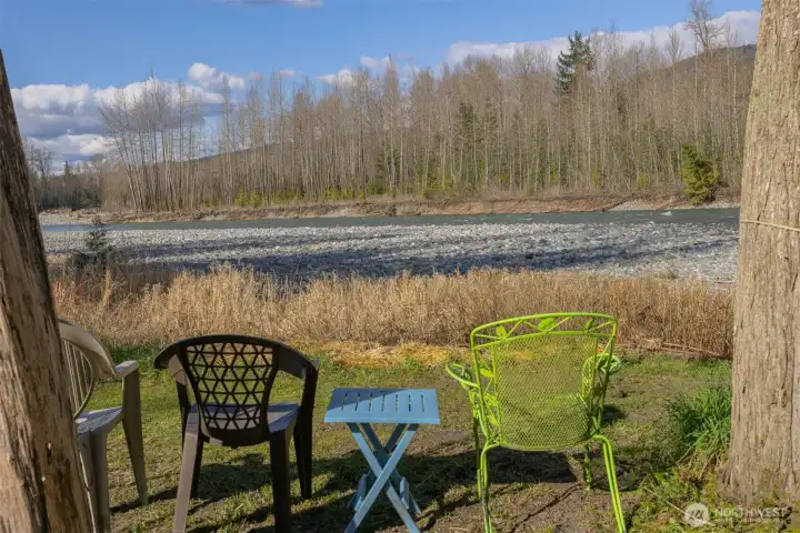 Relax by the river and take in the tranquil natural setting