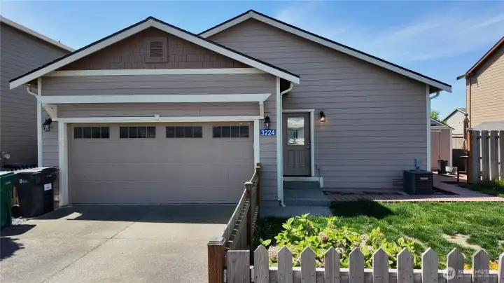 2 car attached with access from alley way.  Fenced yard with nice storage building and newer deck with privacy.  New sod in being installed in backyard and beds freshen up with weekend.