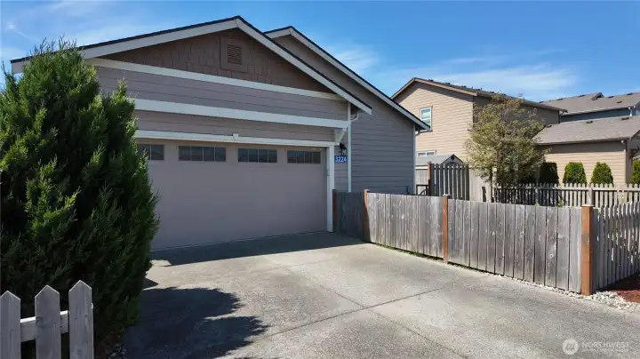 Nice parking area by garage, street parking in front for your guest.