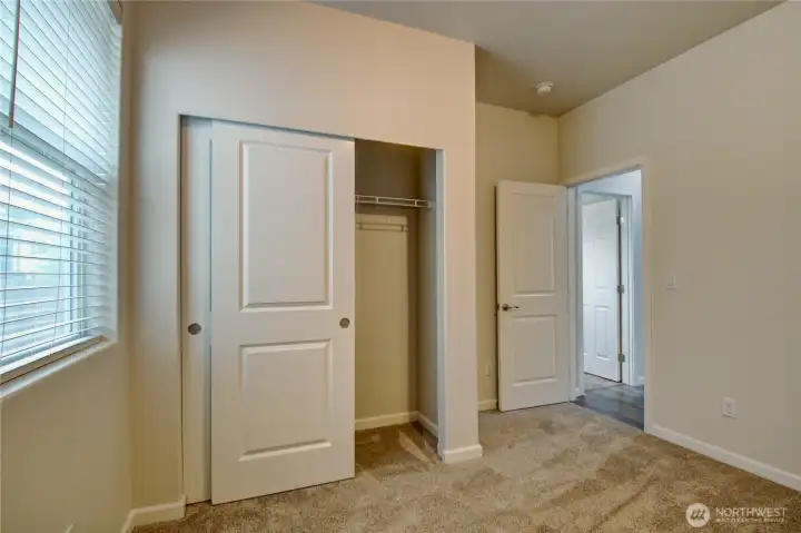3rd bedroom with full bathroom just off the hallway.