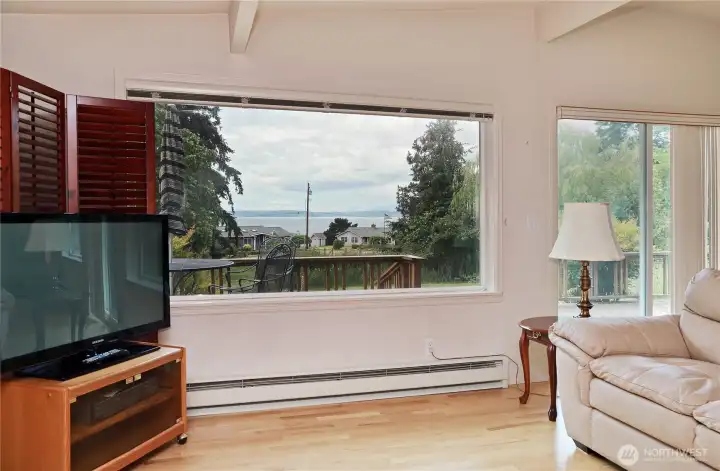 Expansive windows frame the water beyond. Expansive windows frame the water beyond.