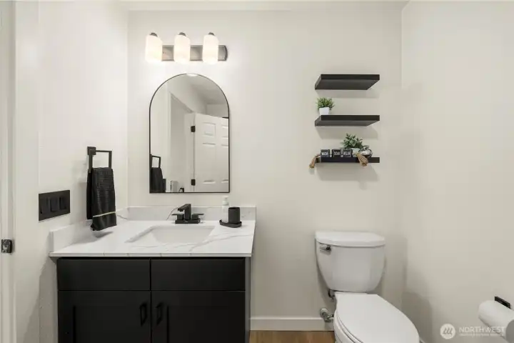 1/2 Bathroom in lower level off of the family room
