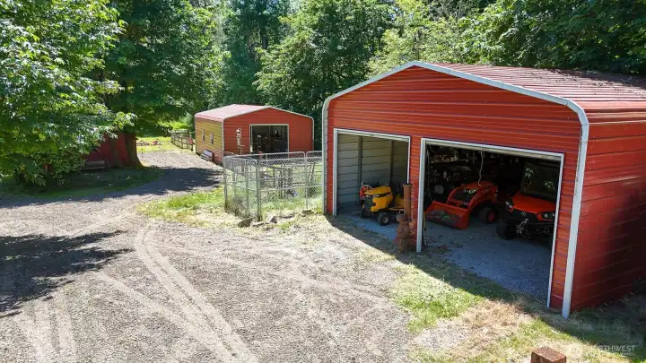 Detached four car garage allows for plumbing storage for toys, power and water to both buildings Detached four car garage allows for plumbing storage for toys, power and water to both buildings