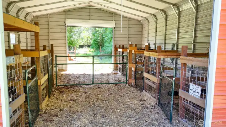 Rollup doors on both sides of the barn allows for easy access, moving animals Rollup doors on both sides of the barn allows for easy access, moving animals