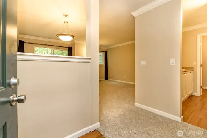 Entry with Kitchen directly to the right.
