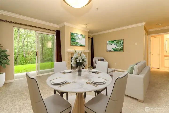 Living space with windows facing greenbelt. Virtually Staged.