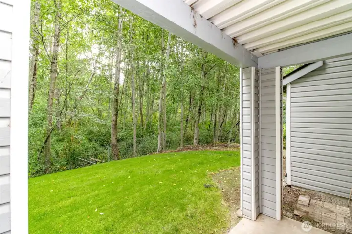 Back patio with views of greenbelt.
