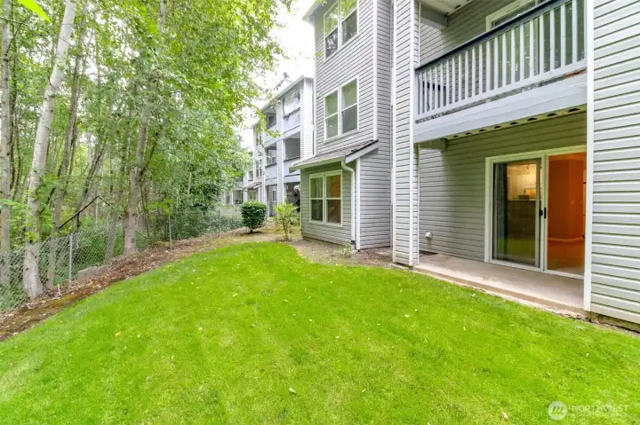 Home backs to lush greenbelt.