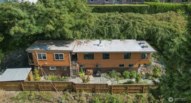 Drone view of both homes on 1 lot:  On the right:  Main (south) home and on the left:  Cottage (south) home