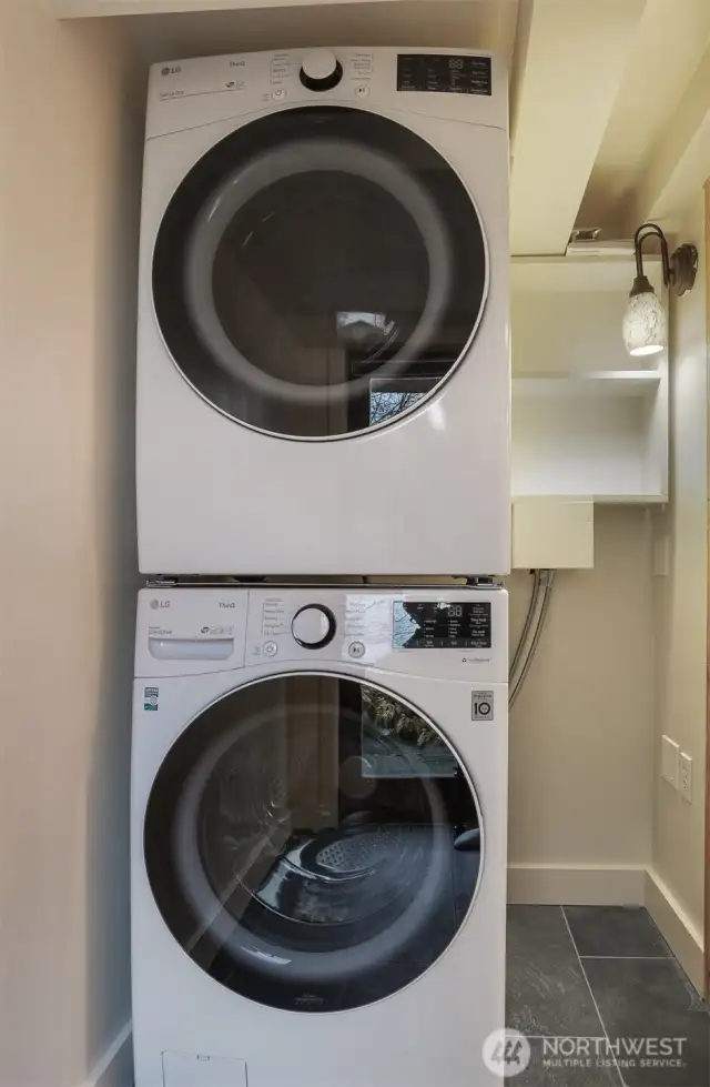 Utility room on the lower level of the Main (South) home was a separate exterior entry and can be used by both homes.