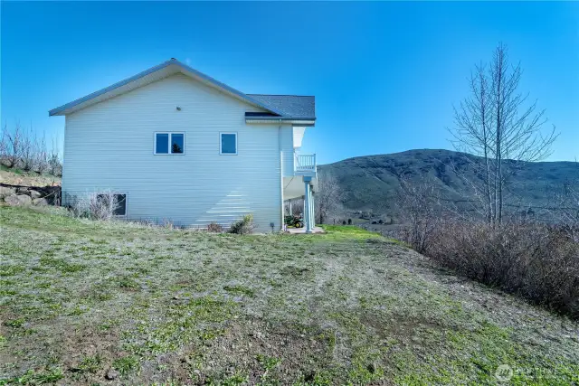 Side of the house where the yard is located.