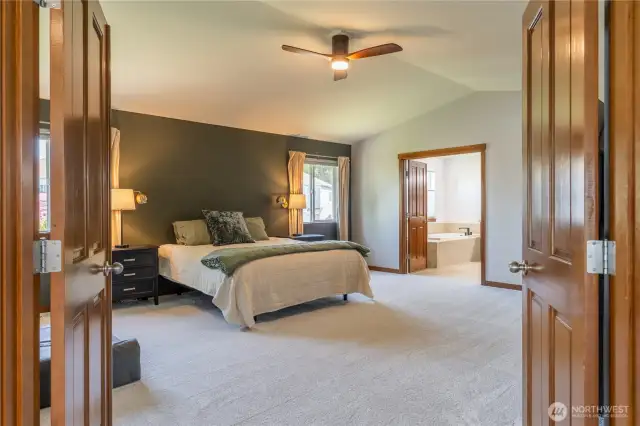 primary with french doors and fireplace