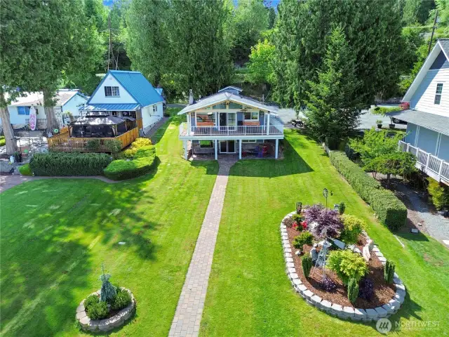Gorgeous landscaping plus sprinkler system.