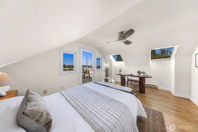 Upstairs bedroom which leads to huge deck with views