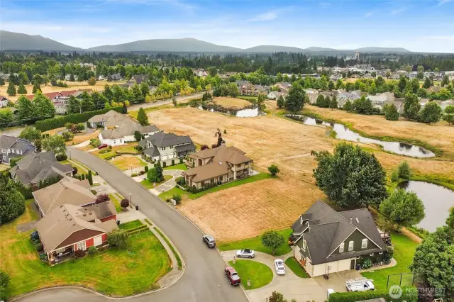 It’s surrounded by other gorgeous custom homes.