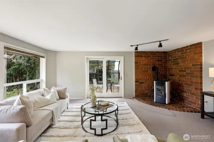 Informal living space off the kitchen and access to the sunroom.
