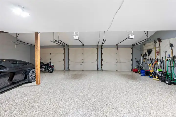 3 car garage with epoxy flooring.