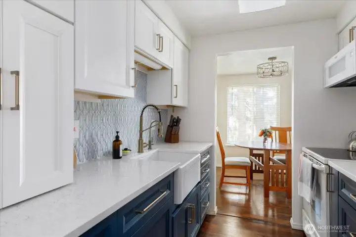 Dishwasher is in hidden in cabinets to the lower left.