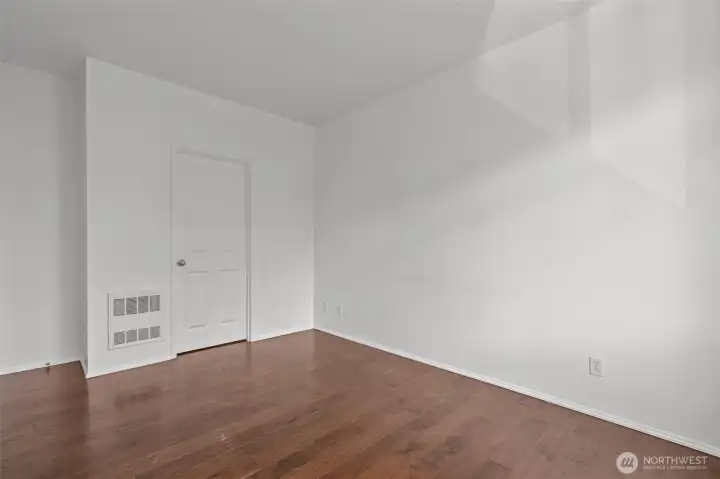 Comfortable primary bedroom with walk-in closet and abundant natural light